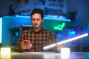 Compact, portable mini LED lamp isolated on a bright background.