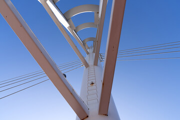column of sunspension bridge against clear sky