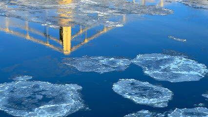 Bridge Reflected in Icy Water