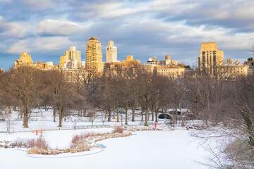 Winter view at Upper East Side cityscape at sunset from Central Park