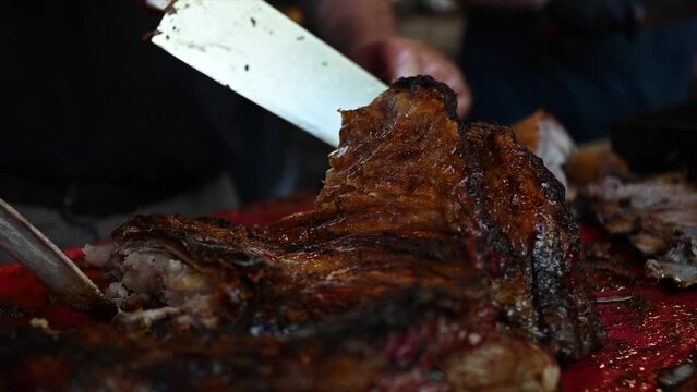 slow motion video of grilled Argentine roast beef 5