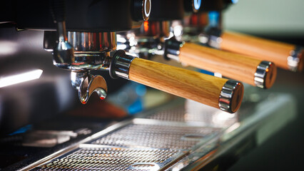 Fototapeta na wymiar Coffee machine in a cafe close-up before making coffee