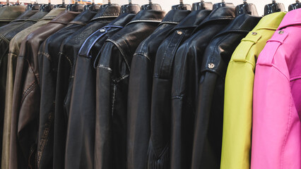 Multicolored leather jackets in the market