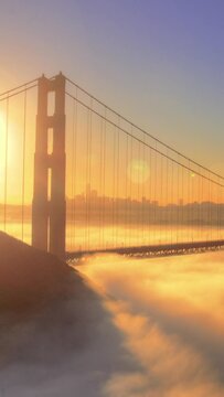 golden gate bridge with low fog at sunrise. Vertical design in 9:16 ratio for smartphone and social media