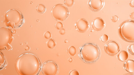 Cosmetic serum water bubbles on peach fuzz background. Transparent gel serum texture. Water and bubbles background. Advertising cosmetology concept.