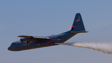 C-130J in a firefighting drop