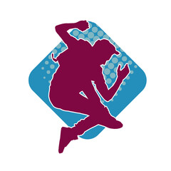 Silhouette of a slim man dancing pose. Silhouette of a male dancer in action pose.