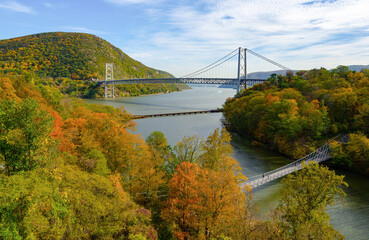 Aerial View of Bear Mountain Bridge during fall with mountains.