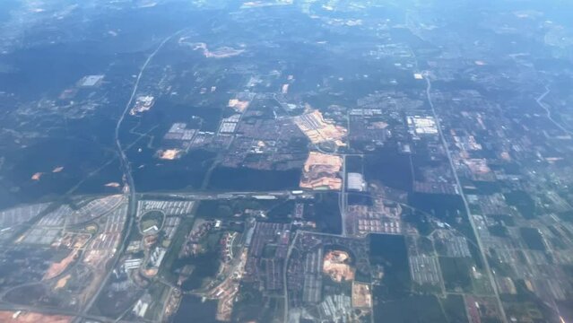 Beautiful aerial view seen through window of flying airplane