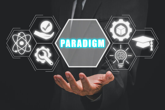 Paradigm concept, Businessman hand holding paradigm icon on virtual screen. Philosophy, Science, Theory, Thought Pattern, Rhetoric, Postulate.