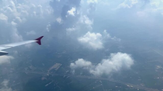 Beautiful aerial view seen through window of flying airplane