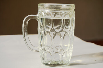 Fresh water in a clear glass cup, healthy drinking water for daily activities