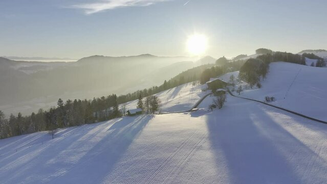 Low sun over the Jura mountains in winter with snow, Brunnersberg, second Jura mountain range, drone image, Matzendorf, Solothurn, Switzerland, Europe