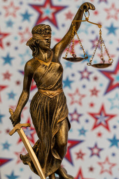 Gold Lady Justice with Red, White and Blue Stars