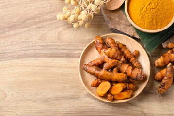 Fresh turmeric and powder, Spice in Asian cuisine, Table top view