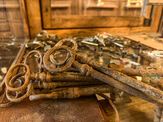 Pile of old, small, and large keys in a museum