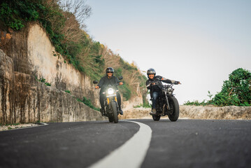 indonesian riders having fun while traveling together with friend