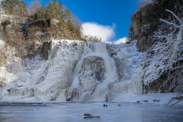 Afternoon winter aerial photo of frozen Ithaca Falls on Fall Creek, City of Ithaca, NY, USA...