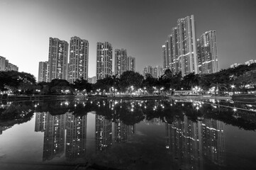 High rise residential building in Hong Kong city at dusk