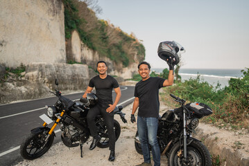 leisure activity of indonesian men riding motorbike with friend