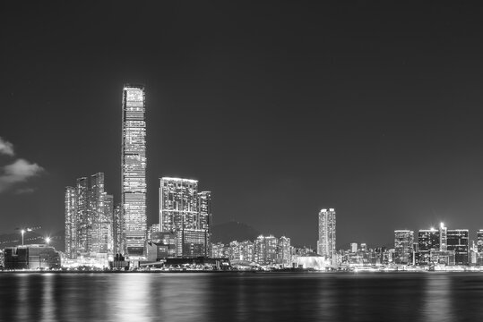 Panorama of skyline of Victoria harbor of Hong Kong city at night © leeyiutung
