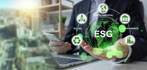 Businessman analyze investment sustainability ESG icons. ESG environmental protection concept, sustainable development, climate change, green energy recycle, Net zero and carbon neutral. - obrazy, fototapety, plakaty