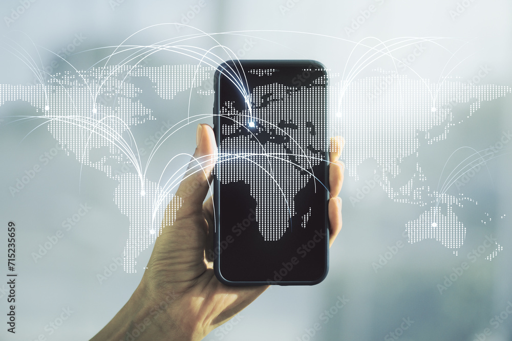 Poster double exposure of abstract digital world map with connections and hand with cell phone on backgroun