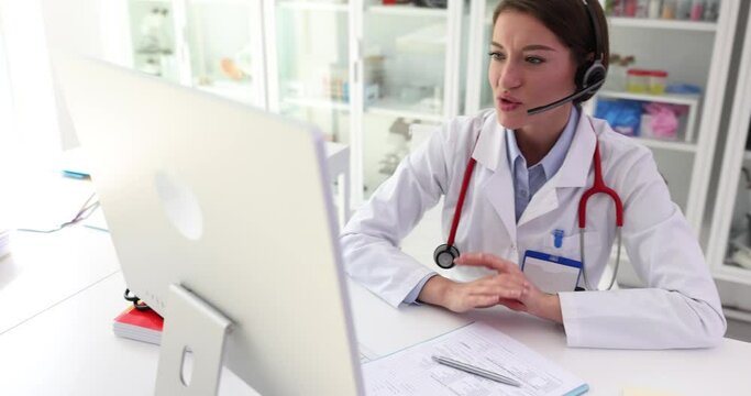 Online medical consultation and female doctor talking online with patient through headset