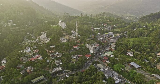 Ella Sri Lanka Aerial v12 establishing shot birds eye view drone flyover town center around hillside resort hotels and residential areas at sunset golden hours - Shot with Mavic 3 Cine - April 2023