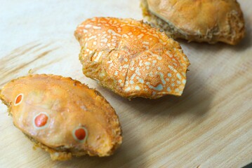 cooked crab on wooden background, seafood restaurant menu