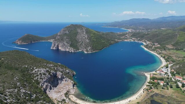 Porto Koufo Beach and Bay in Sithonia, Halkidiki, Greece - Aerial 4k Backwards