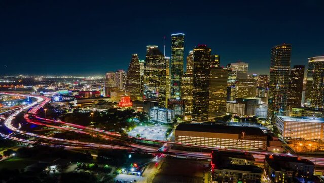 Houston Downtown Drone Time-lapse. Aerial Hyperlapse Above Houston Texas Highway I45 Interstate Freeway at Night.
