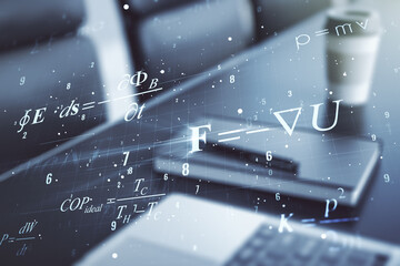 Double exposure of creative scientific formula concept on laptop background, research and...
