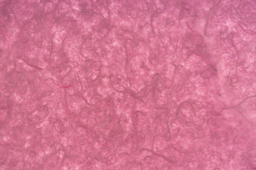 Pink color mulberry paper texture background.