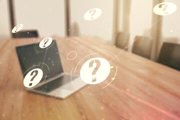 Creative abstract question mark sketch on modern laptop background, FAQ and research concept....