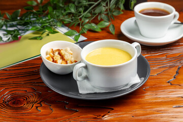 Cream cheese soup with croutons. Dinner.