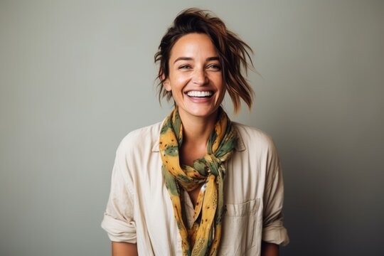 Portrait Of A Beautiful Young Woman Laughing And Looking At The Camera