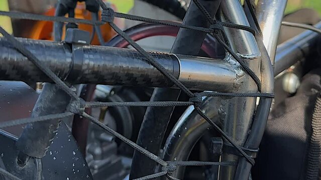 Close up detail of carbon steel paramotor paraglider frame structure