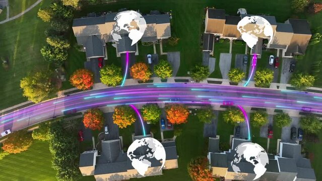 Modern American homes connected with fast internet. Top down aerial truck shot of suburban houses with colorful digital connectivity lines and globe icons. Fiber optic network animation.
