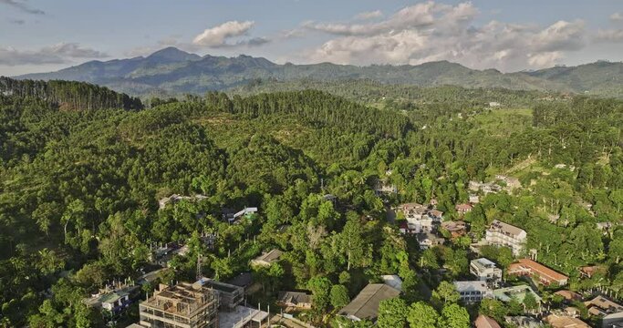 Ella Sri Lanka Aerial v2 cinematic drone flyover hillside resort hotels capturing mountainscape of hilly terrains and lush pristine landscape of verdant valleys - Shot with Mavic 3 Cine - April 2023