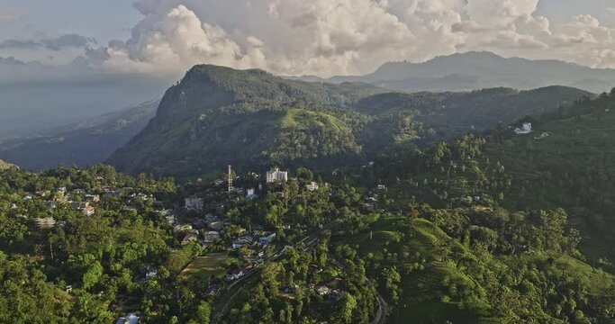 Ella Sri Lanka Aerial v3 drone flyover secluded village town surrounded by mountainous landscape capturing railway station, hillside resort hotels and residential - Shot with Mavic 3 Cine - April 2023