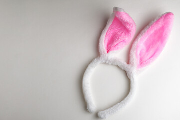 Easter bunny ears on a white background with copy space