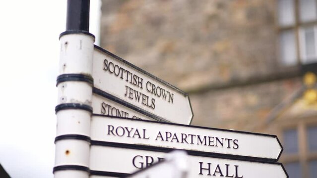 Edinburgh castle in Scotland. Sign for royal scots museum. Historic medieval castle in old town. Travel destination, tourism landmark in UK.
