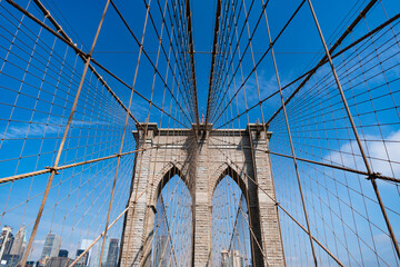 Brooklyn bridge in New York. Architecture of historic bridge in Brooklyn. Brooklyn bridge of New York city. New York bridge connecting Manhattan and Brooklyn. New York city architecture