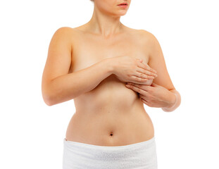 Woman examining breast isolated on white background
