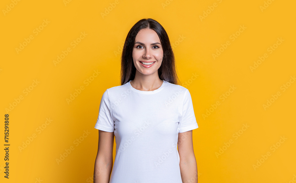 Wall mural woman isolated on yellow. millennial woman wearing white tshirt. casual style of millennial woman. p - Wall murals