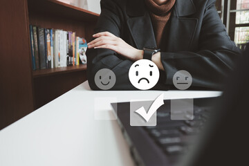 Customer satisfaction concept, evaluate dissatisfied low service by laptop, discontent and not satisfied, choose no smile - obrazy, fototapety, plakaty