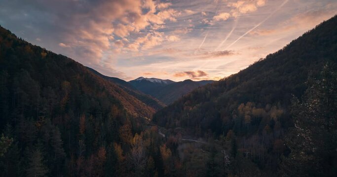 timelapse of colorful sunset in pyrenees valley during fall autumn season pardina del senor forest valley and mountains