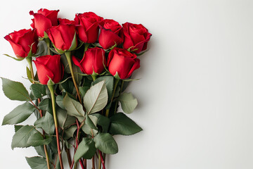 A bouquet of vibrant red roses with stems and leaves against a white background, symbolizing romance and often associated with Valentine's Day