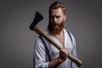 Retro style. Handsome and charismatic. Masculine man. Masculinity of bearded man with axe isolated...